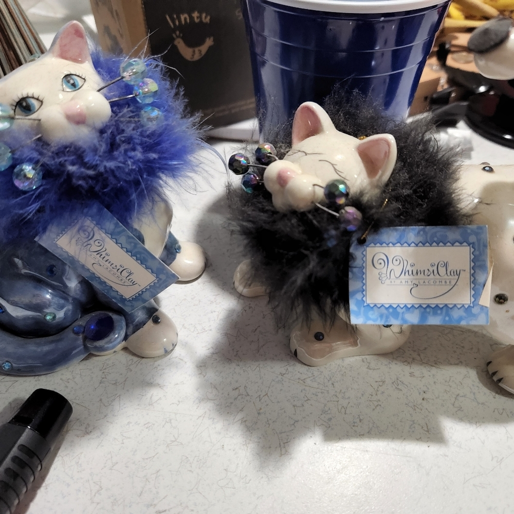 2 porcelain cats